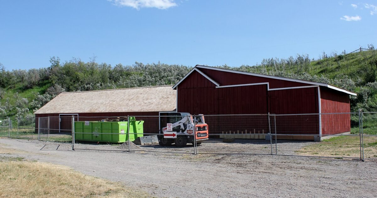 Implement shed at the Bar U Ranch National Historic Site along Highway 22, the Cowboy Trail, in southern Alberta ranch country