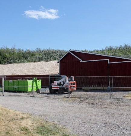 Implement shed at the Bar U Ranch National Historic Site along Highway 22, the Cowboy Trail, in southern Alberta ranch country