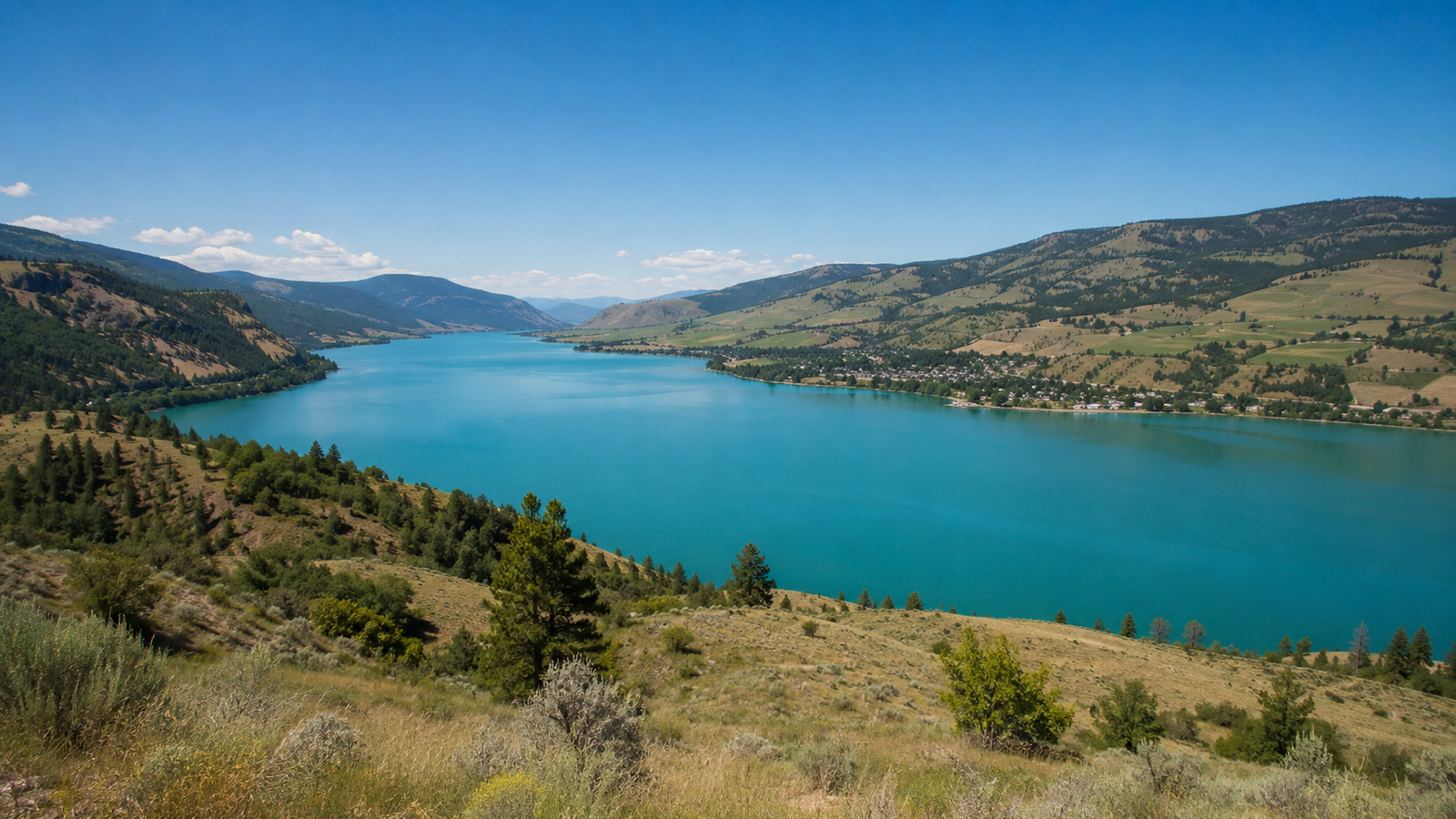 Vernon, BC lakeside view with Okanagan Lake and surrounding hills