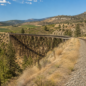 Kettle Valley Railway trestle bridge overlooking vineyards near Summerland, BC