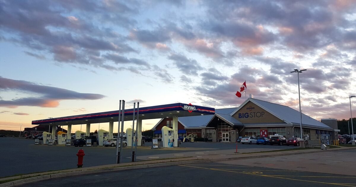 Semi-truck parked at a highway truck stop, illustrating detention and layover wait time